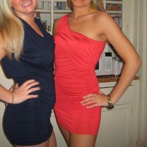 Red caveman shoulder dress